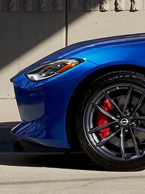 2023 Nissan Z in blue silhouette showing aerodynamic design.