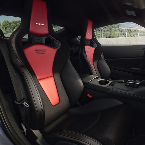 2024 Nissan Z NISMO interior view of leather-appointed Recaro® sport seats in red and black