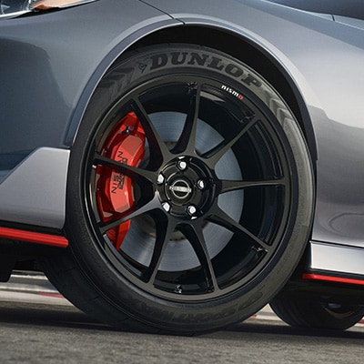 2024 Nissan Z NISMO detail view of wheel with visible brakes and Dunlop® tire
