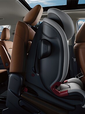 2023 Nissan Pathfinder second-row seat lifted allowing access to the third row