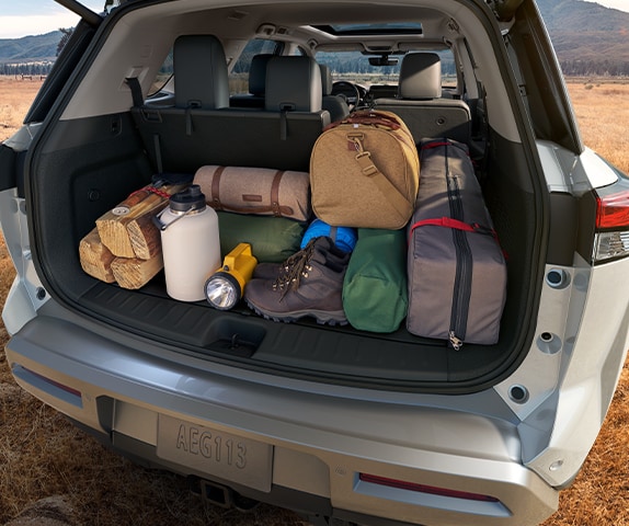 2024 Nissan Pathfinder cargo area with camping gear.