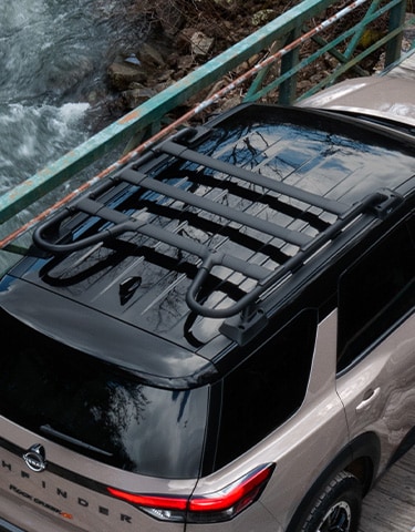 2024 Nissan Pathfinder Rock Creek black tubular roof rack.