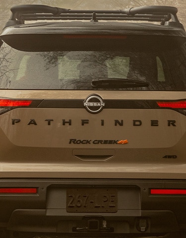 2024 Nissan Pathfinder Rock Creek exclusive rock Creek exterior badging on the back hatch door.