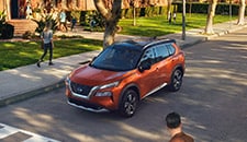 2022 Nissan Rogue illustration showing car on an incline using Hill Start Assist.