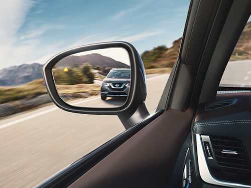 2023 Nissan Rogue driver-side mirror view.