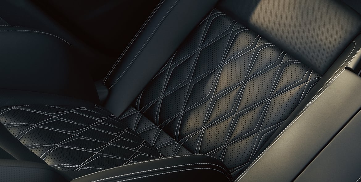 2023 Nissan Rogue showing quilted semi-aniline leather-appointed seat.