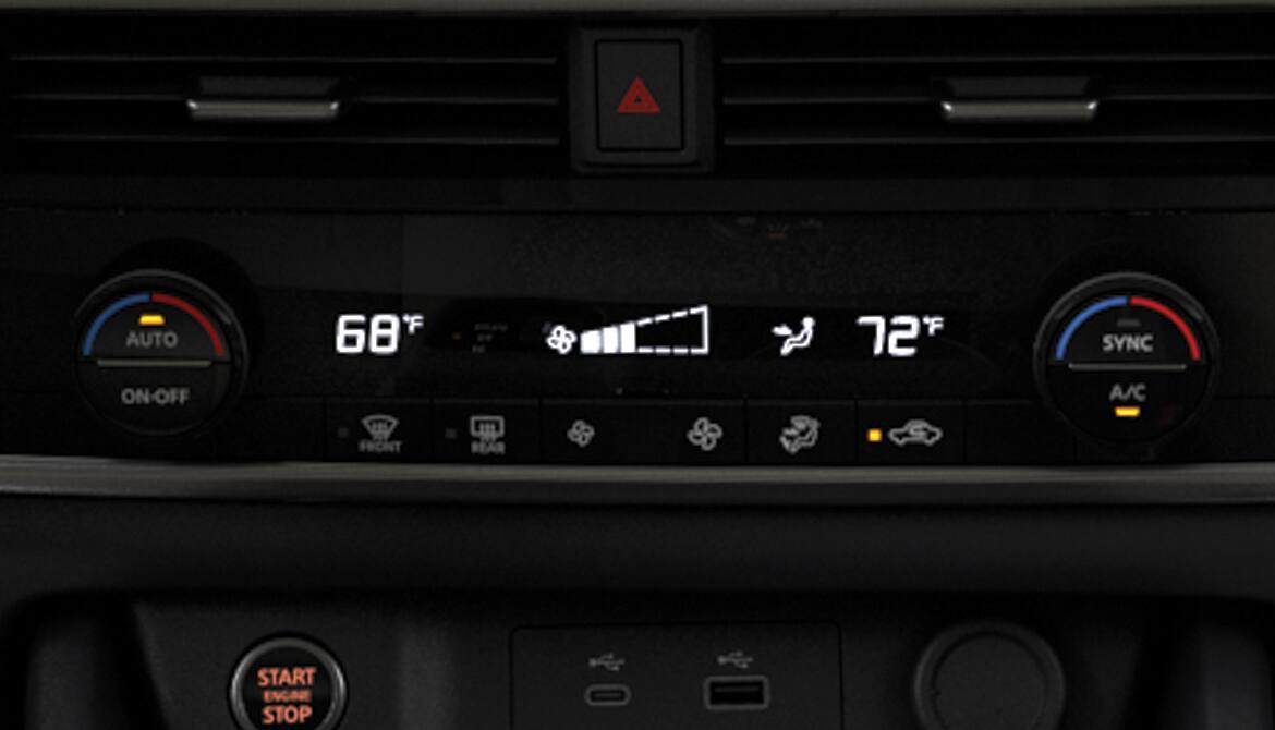 2023 Nissan Rogue dual zone automatic temperature control panel.