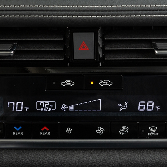 2024 Nissan Rogue interior detail of tri-zone automatic temperature controls