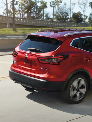 2022 Nissan Rogue Sport in scarlet ember showing roof rails