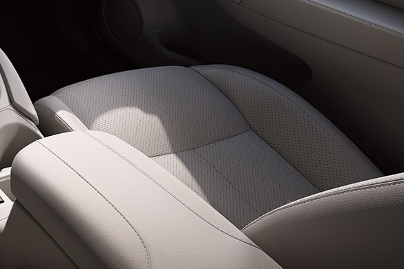 2022 Nissan Rogue Sport showing leather-appointed passenger seat