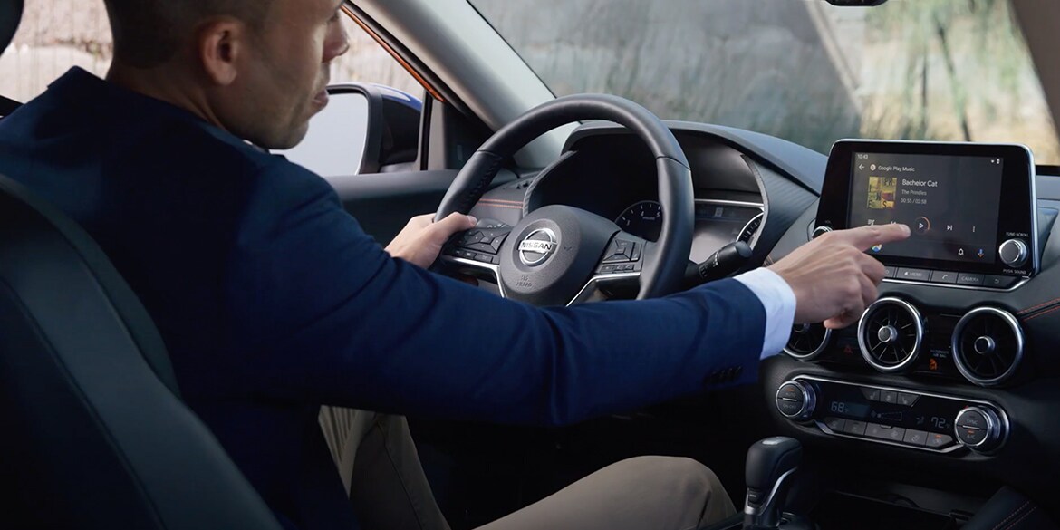 2022 Nissan Sentra with person using touch-screen for music, connectivity video.