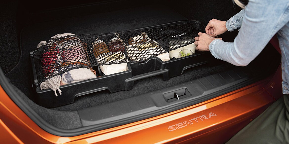 2022 Nissan Sentra Person Packing Trunk Using Hideaway Trunk Net