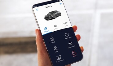 2023 Nissan Sentra showing virtual key app on a smartphone.