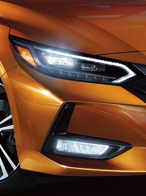 2023 Nissan Sentra showing thin projector LED headlights.