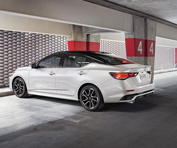 2024 Nissan Sentra in white parked in a parking garage.