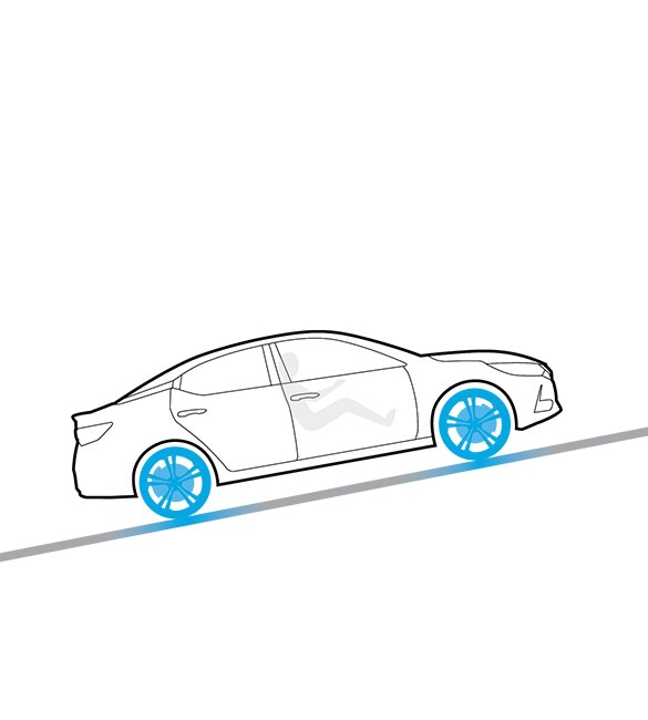 2022 Nissan Versa illustration of car on a hill using hill start assist