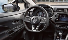 2022 Nissan Versa showing leather wrapped steering wheel.