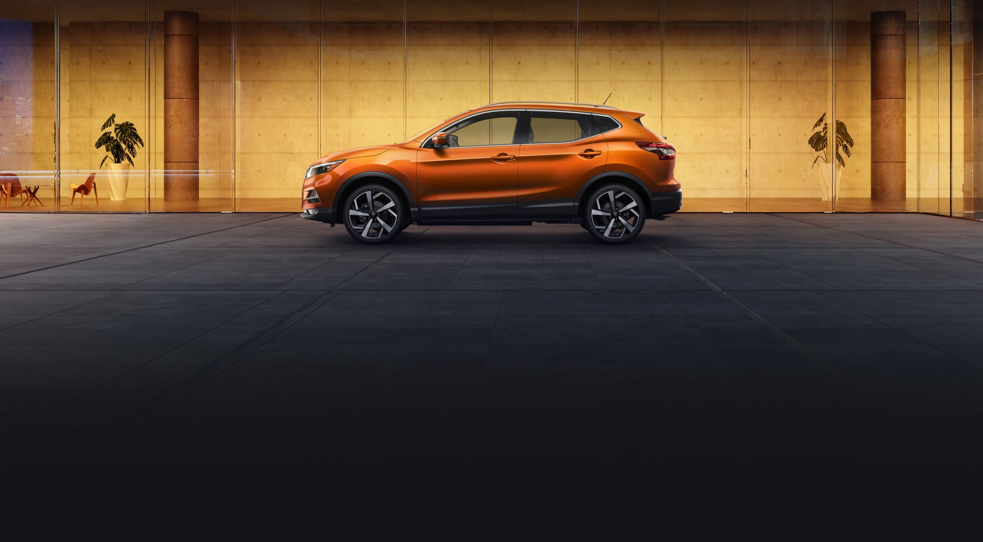 2023 Nissan Rogue Sport in profile outdoors. 